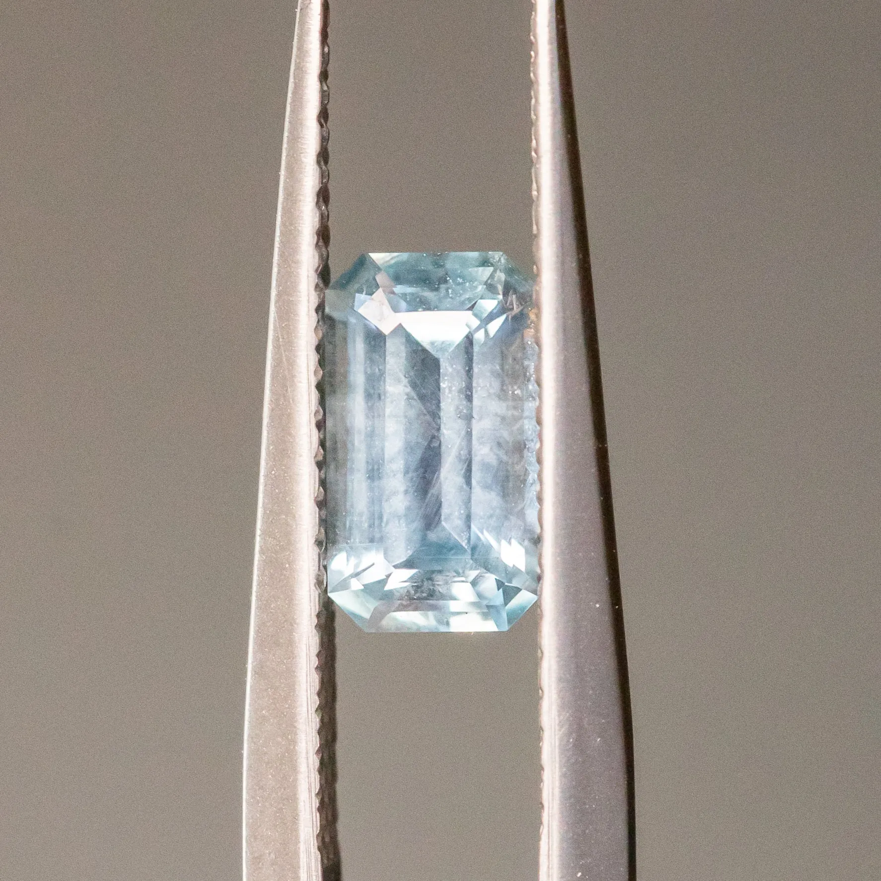 1.22CT EMERALD CUT MONTANA SAPPHIRE, ICEY BLUE GREY, 8X4.5X4MM