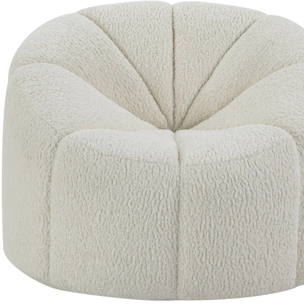 38 White And Black Sherpa Swivel Barrel Chair