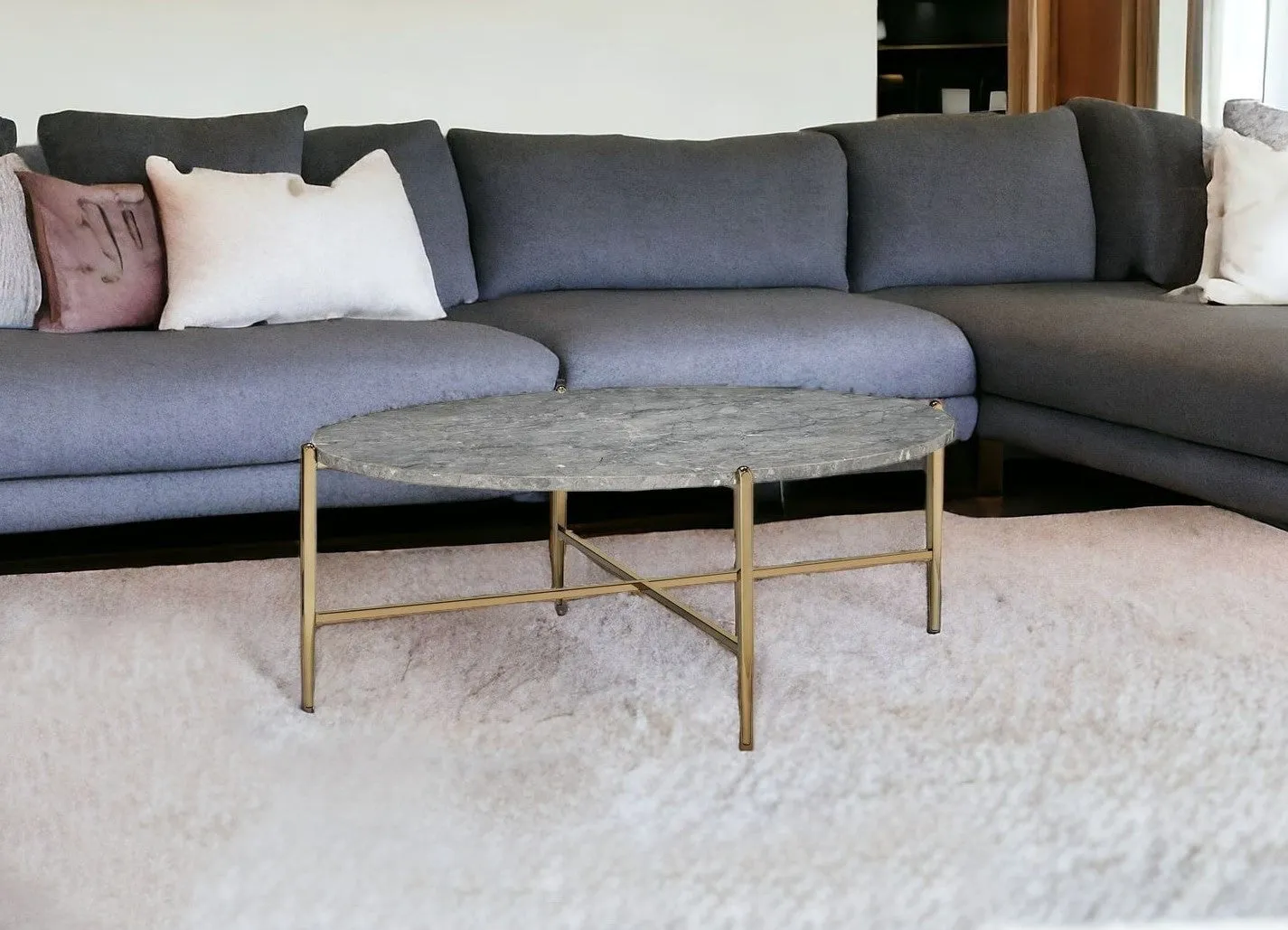 48 Gray And Champagne Faux Marble And Metal Oval Coffee Table