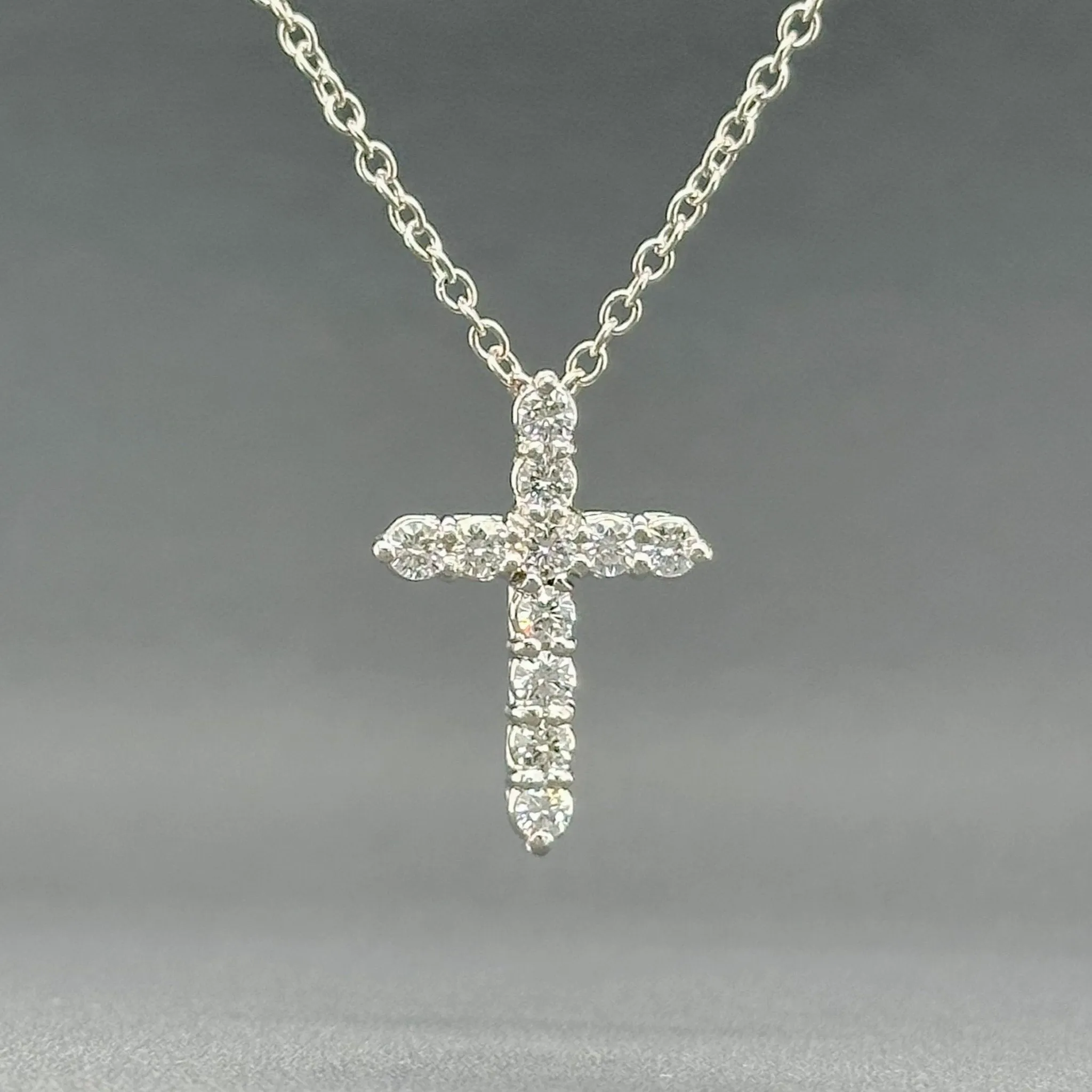 Estate Platinum 0.50ctw H/SI1 Diamond Cross Pendant