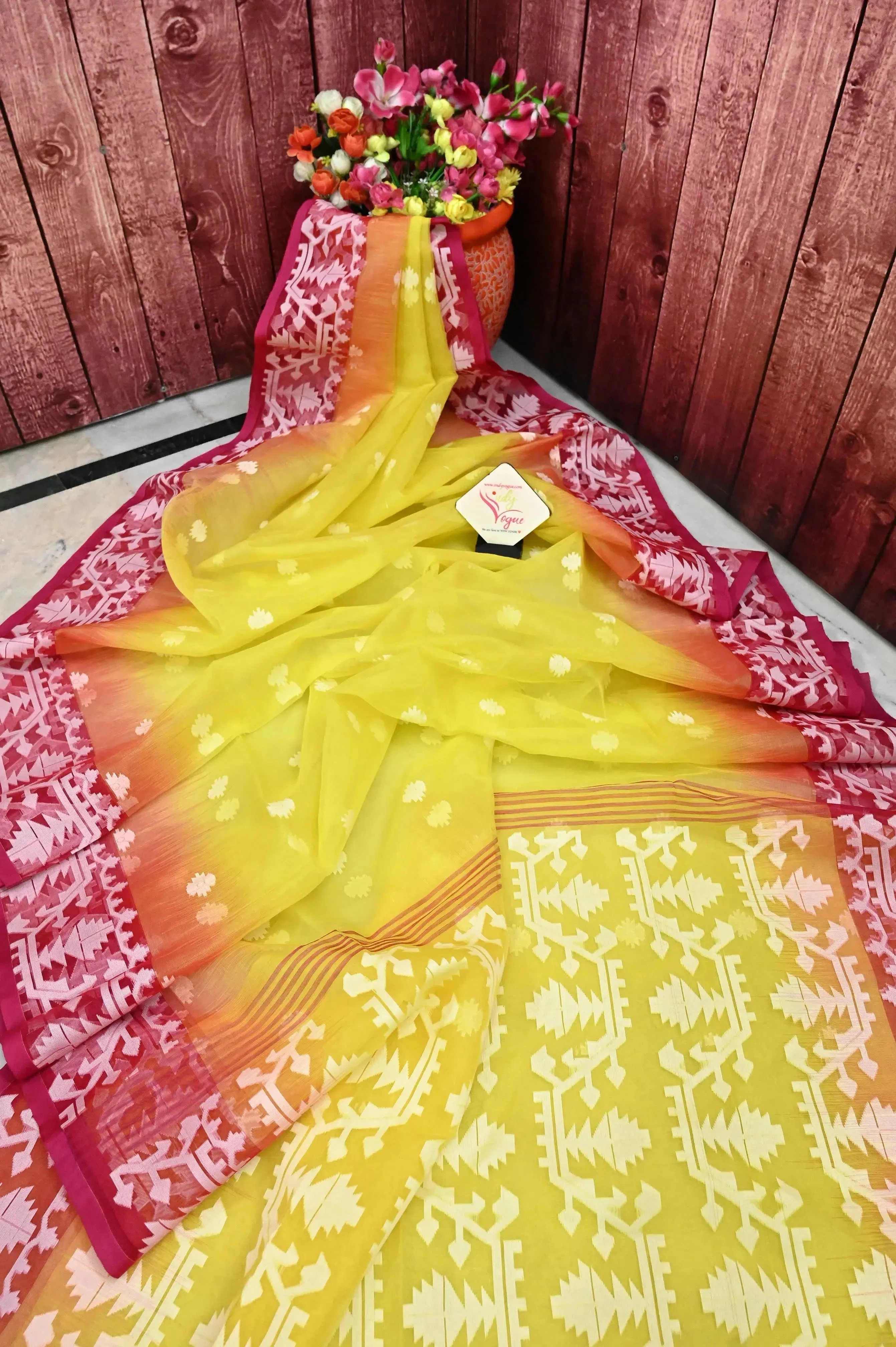 Lemon Yellow Color Muslin Jamdani Saree with Ikat Style Jamdani Weaving