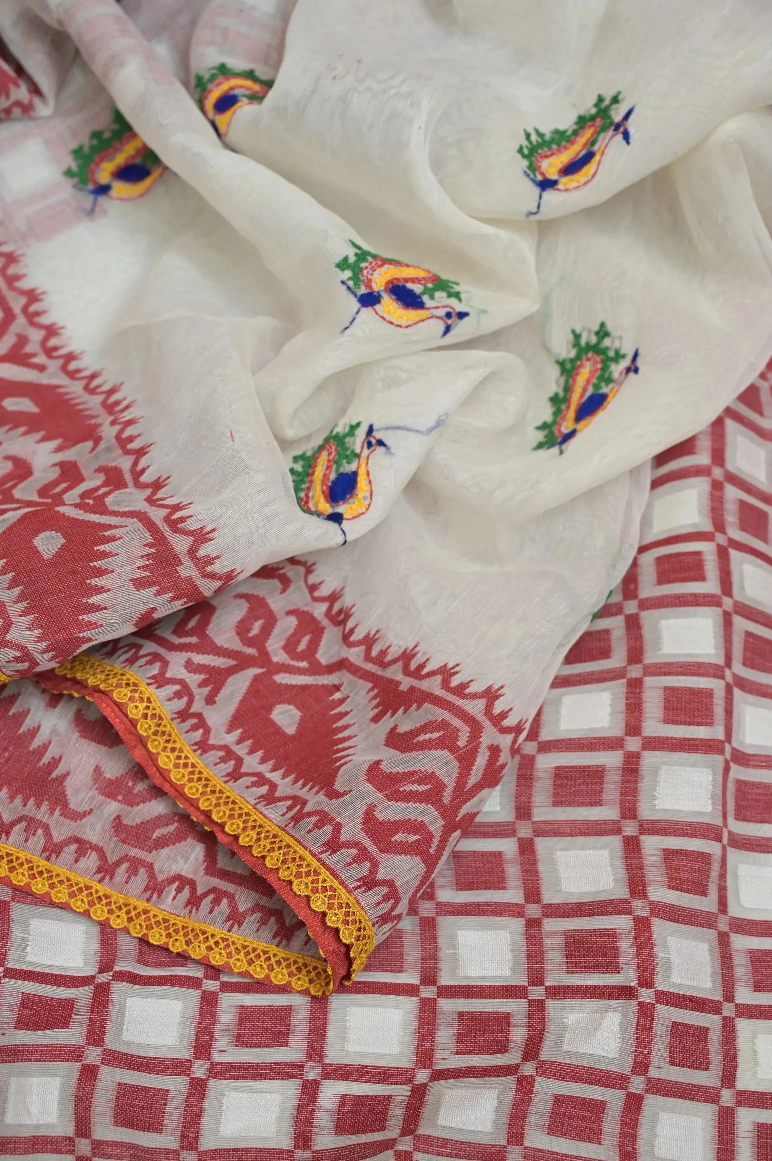 White and Red Color Jamdani Saree with Patli Pallu and Gujrati Hand Embroidery